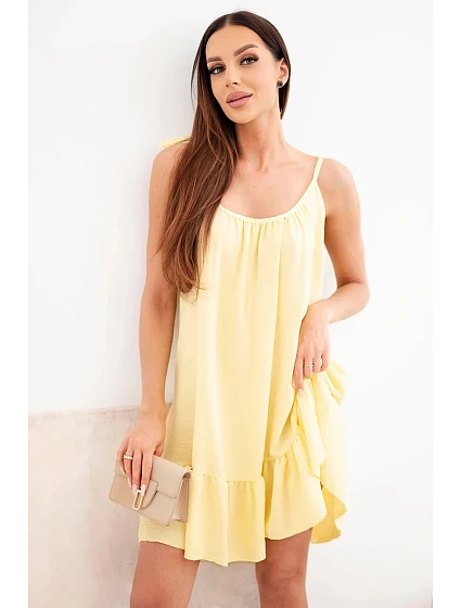 Dámské viskózové šaty na ramínka s volánem a zavazováním žluté Dámské viskózové šaty na ramínka s volánem a zavazováním žluté