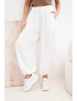 Dámské široké kalhoty s gumou v pase a vázáním v model 22064355 stylu ecru - K-Fashion