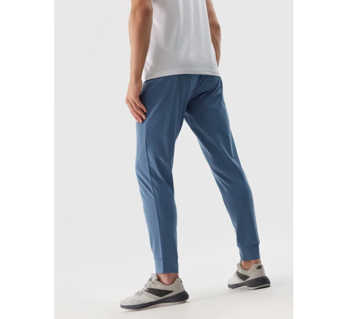 Pánské sportovní rychleschnoucí kalhoty 4F - denim Pánské sportovní rychleschnoucí kalhoty 4F - denim