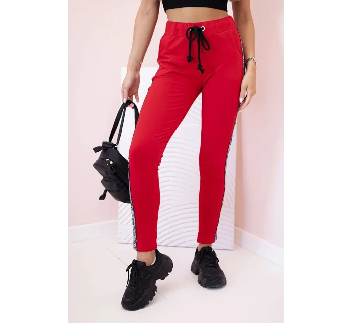 Dámské teplákové kalhoty s lampasem a šňůrkou v pase červené