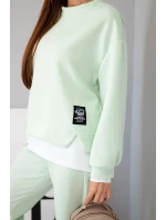Dámský komplet s volnou mikinou a tepláky jasně mátová model 21808631 - K-Fashion Dámský komplet s volnou mikinou a tepláky jasně mátová model 21808631 - K-Fashion