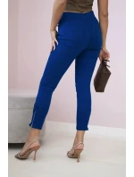 Barevné džínové kalhoty s chrpovou mašlí