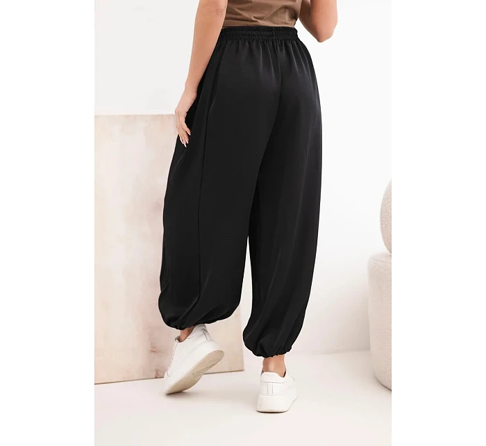 Dámské široké kalhoty s gumou v pase a vázáním ve stylu model 22064413 černé - K-Fashion