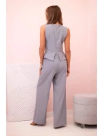 Dámská kombinéza bez rukávů s širokými nohavicemi a ozdobnými knoflíky šedý Dámská kombinéza bez rukávů s širokými nohavicemi a ozdobnými knoflíky šedý