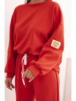 Dámský komplet máslový s volnou mikinou a kalhotami s nápisem LOVE červený Dámský komplet máslový s volnou mikinou a kalhotami s nápisem LOVE červený