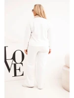 Dámský komplet masełko Plus Size se širokými nohavicemi a límečkem bílý