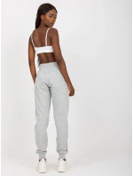 B 005 tepláky.04X šedá