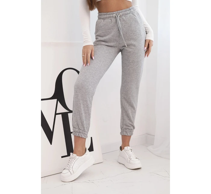 Dámské bavlněné kalhoty s gumou v pase šedé Dámské bavlněné kalhoty s gumou v pase šedé
