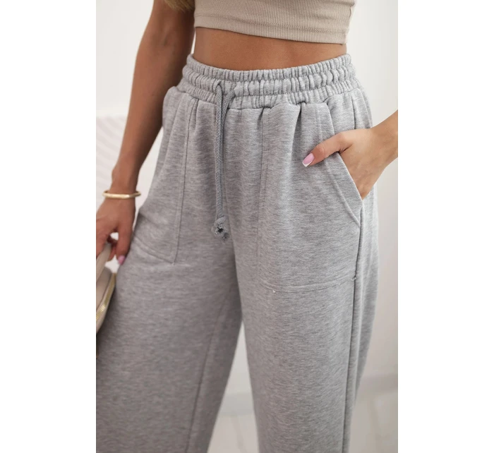 Dámské bavlněné cargo kalhoty s kapsami a řetízkem béžové