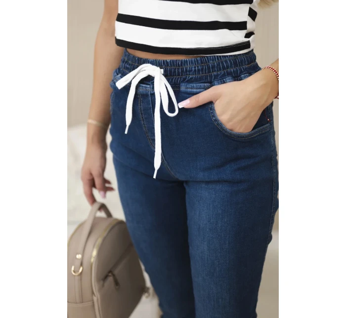 Kalhoty z tmavého denimu s žebrovaným lemem