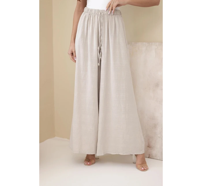 Dámské široké bavlněné kalhoty s gumičkou v pase béžové
