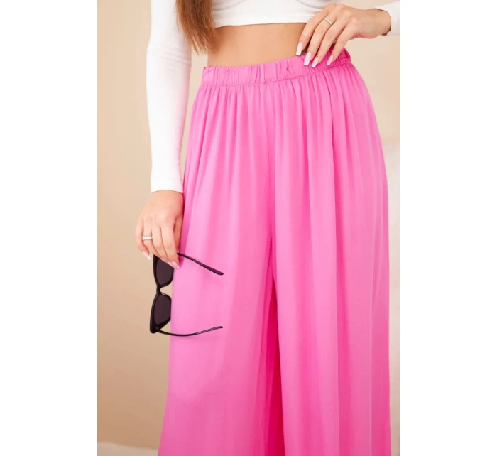 Dámské široké viskózové kalhoty s gumou v pase růžové Dámské široké viskózové kalhoty s gumou v pase růžové
