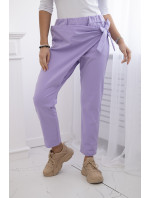 Kalhoty zavazované s asymetrickým předním dílem světle fialová