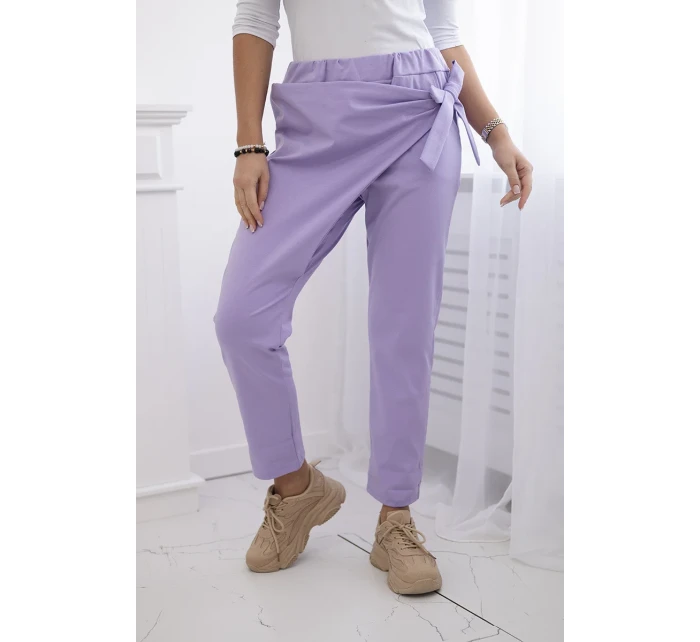 Kalhoty zavazované s asymetrickým předním dílem světle fialová