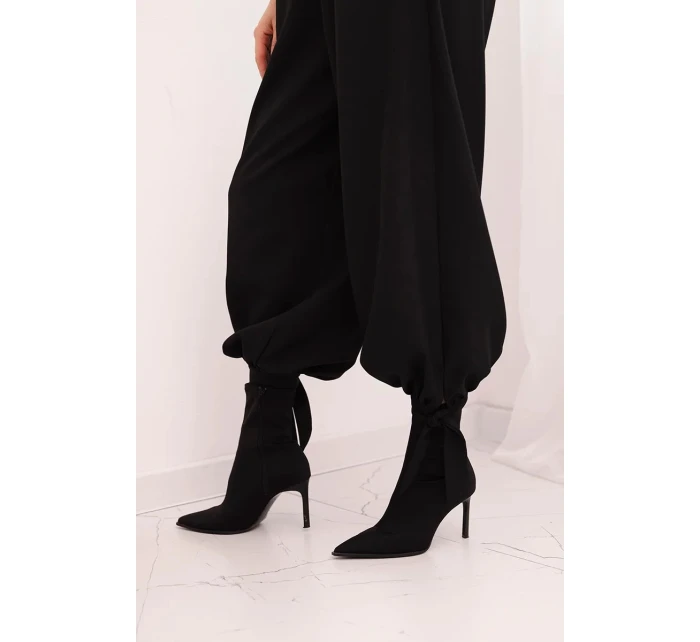 Dámské kalhoty s širokou nohavicí a zavazováním dole černé Dámské kalhoty s širokou nohavicí a zavazováním dole černé