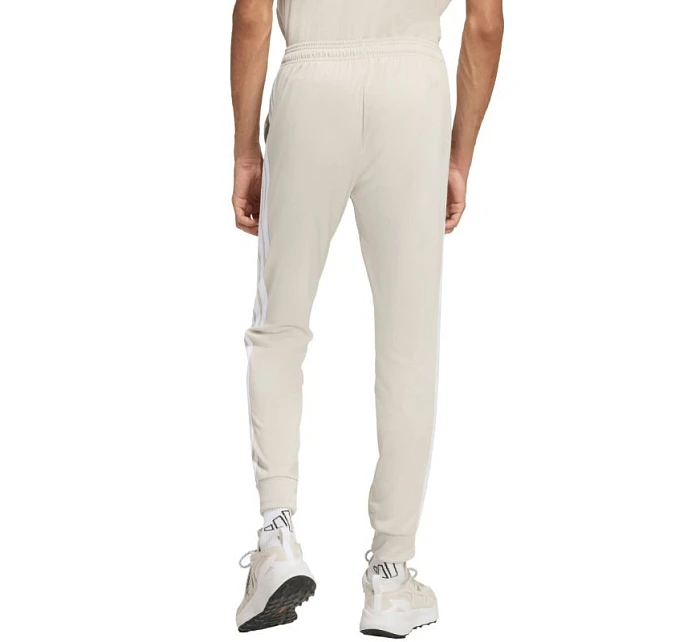 Pánské kalhoty 3Stripes Tricot Regular Tapered béžové model 22063052 - ADIDAS Pánské kalhoty 3Stripes Tricot Regular Tapered béžové model 22063052 - ADIDAS