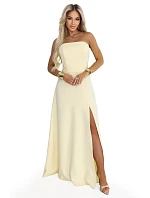 maxi šaty s rozparkem a zavazováním na zádech žluté model 22064816 - numoco maxi šaty s rozparkem a zavazováním na zádech žluté model 22064816 - numoco