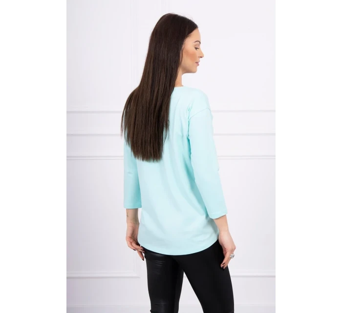 Halenka s 3D grafikou plameňáka v mátové barvě