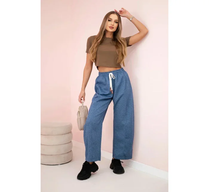 Máslové kalhoty zavazované v pase džínový melír Máslové kalhoty zavazované v pase džínový melír