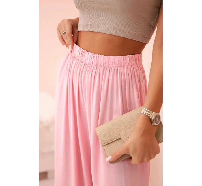 Široké dámské kalhoty s elastickým pasem světle růžová Široké dámské kalhoty s elastickým pasem světle růžová