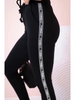 Dámské teplákové kalhoty s model 21154153 a šňůrkou v pase černé - K-Fashion
