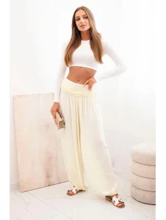 Dámské viskózové kalhoty s širokými nohavicemi a volánky žlutý