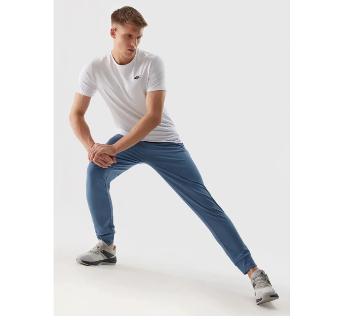 Pánské sportovní rychleschnoucí kalhoty 4F - denim Pánské sportovní rychleschnoucí kalhoty 4F - denim