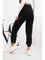 Dámské bavlněné kalhoty s gumou v pase černé Dámské bavlněné kalhoty s gumou v pase černé