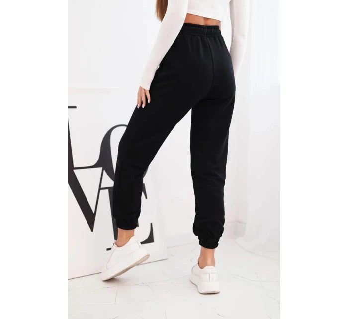 Dámské bavlněné kalhoty s gumou v pase černé Dámské bavlněné kalhoty s gumou v pase černé