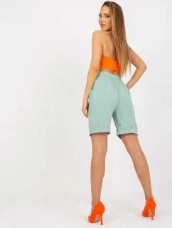 BR SN 102 šortky.70 mincí