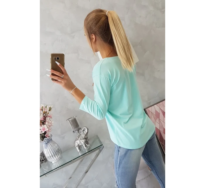 Halenka s 3D grafikou a zdobenými volánky mint Halenka s 3D grafikou a zdobenými volánky mint