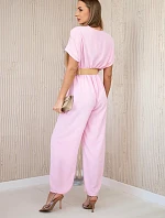 Kombinéza s ozdobným páskem v pase bonbónově růžová
