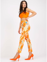 Oranžové dámské kalhoty se vzory