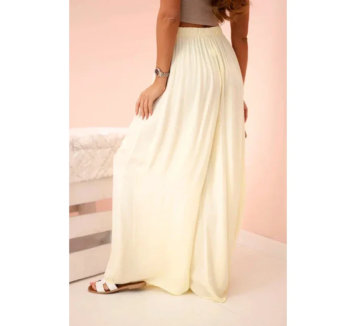 Široké dámské kalhoty s elastickým pasem žlutý