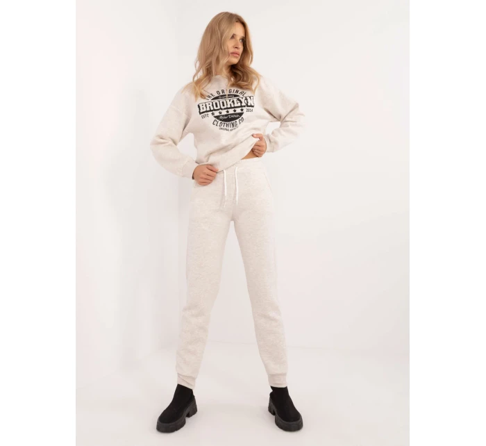 Spodnie dresowe EM DR model 20496376 jasny beżowy - FPrice Spodnie dresowe EM DR model 20496376 jasny beżowy - FPrice