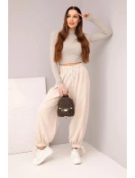 Dámské kalhoty s širokým nohavicí a vázáním dole béžové