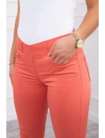 Tmavě meruňkové džínové kalhoty