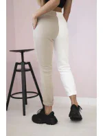 Dámské tepláky s nápisem QUEEN béžový