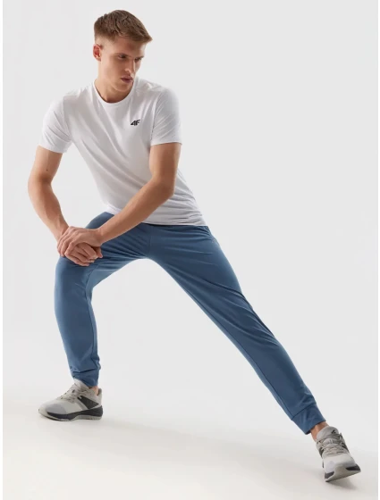 Pánské sportovní rychleschnoucí kalhoty 4F - denim Pánské sportovní rychleschnoucí kalhoty 4F - denim