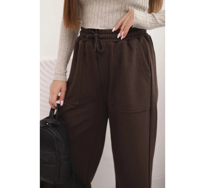 Dámské bavlněné cargo kalhoty s kapsami a řetízkem béžové Dámské bavlněné cargo kalhoty s kapsami a řetízkem béžové