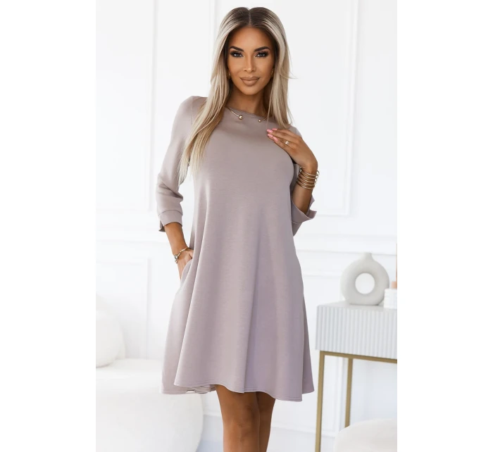 Béžové klasické trapézové dámské šaty s černým opaskem model 20698422 - numoco Béžové klasické trapézové dámské šaty s černým opaskem model 20698422 - numoco