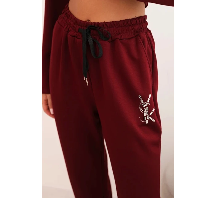 Dámský komplet s viskózou s ozdobami a elastickými kalhotami bordový Dámský komplet s viskózou s ozdobami a elastickými kalhotami bordový