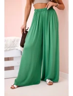 Široké dámské kalhoty s elastickým pasem zelený