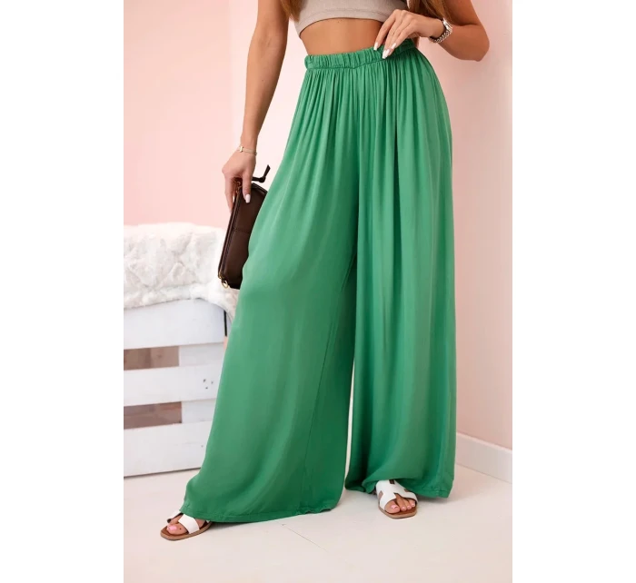 Široké dámské kalhoty s elastickým pasem zelený