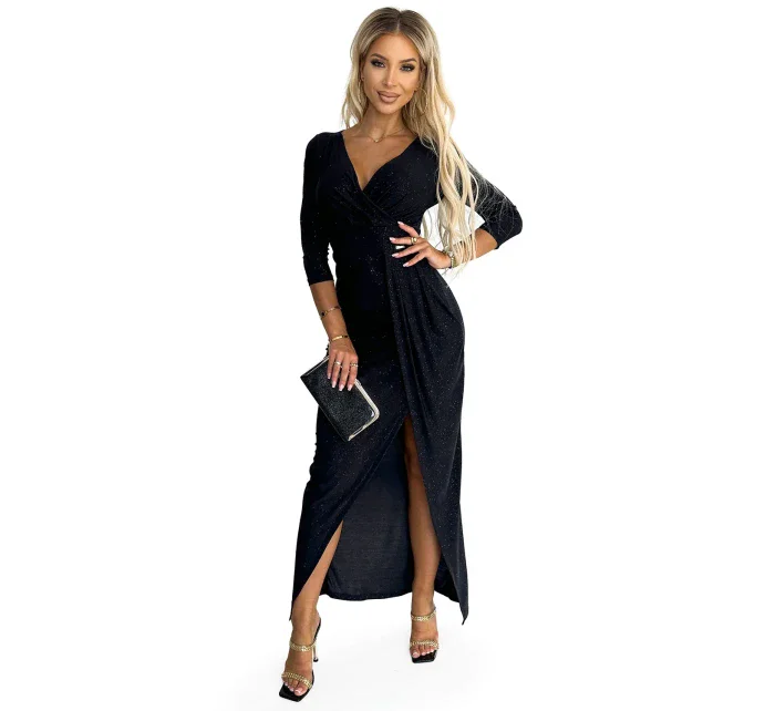 Lesklé černé dlouhé dámské šaty s výstřihem, rozparkem na noze a s brokátem model 18960458 - numoco Lesklé černé dlouhé dámské šaty s výstřihem, rozparkem na noze a s brokátem model 18960458 - numoco