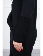 Šaty s ozdobnými volánky a kapucí černé barvy Šaty s ozdobnými volánky a kapucí černé barvy