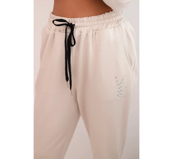 Komplet dámský s viskózou s ozdobami a elastickými kalhotami béžový Komplet dámský s viskózou s ozdobami a elastickými kalhotami béžový