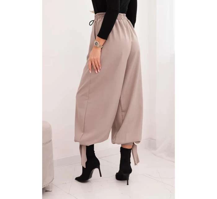 Dámské kalhoty se širokými nohavicemi a zavazováním dole fango