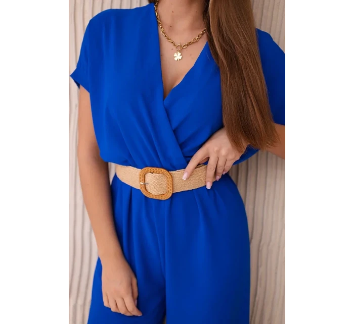 Kombinéza s ozdobným páskem v pase chrpově modrá Kombinéza s ozdobným páskem v pase chrpově modrá