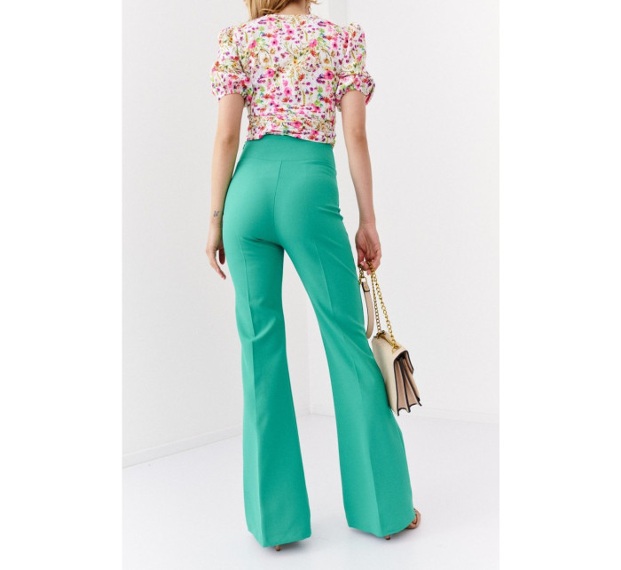 Elegantní zelené dámské kalhoty s rozšířenými nohavicemi